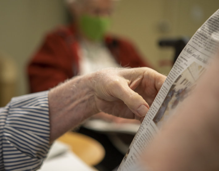 Elderly man reading